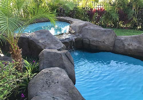 image of natural rock swimming pool by Poseidon Pools Hawaii