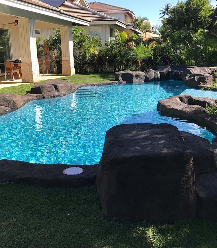 image of natural rock swimming pool by Poseidon Pools Hawaii