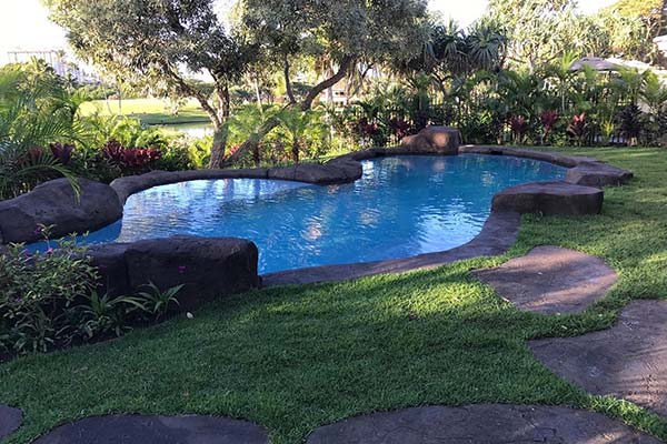 image of natural rock swimming pool by Poseidon Pools Hawaii